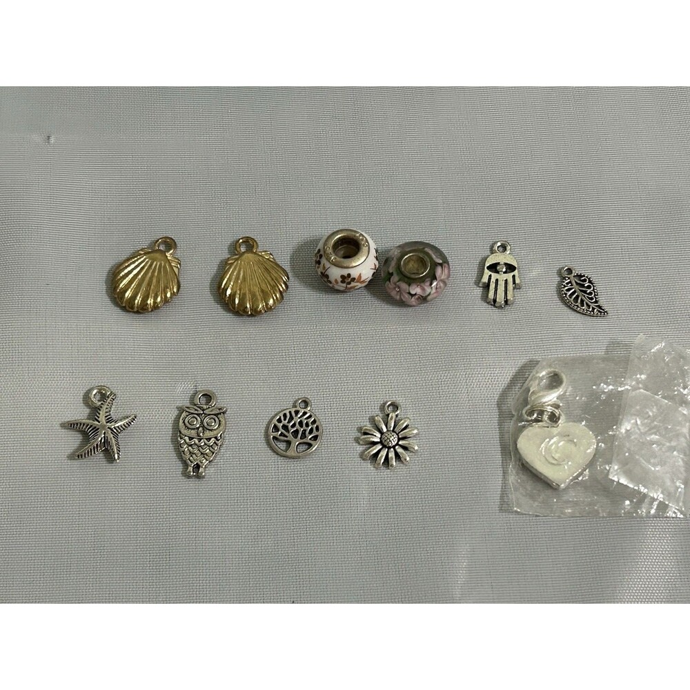 11 piece lot of charms and pendants 1 925 10 fashion metals